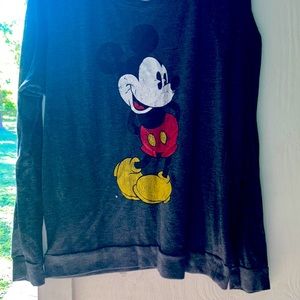 It’s Mickey Mouse longsleeve I would Put something under it it’s see-through